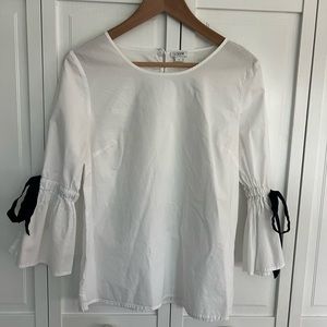 J.Crew Factory white cotton bell sleeve blouse with navy blue ties. Size small.
